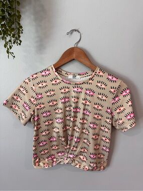 Beige Crop Muscle Tee with Pink Eye Print